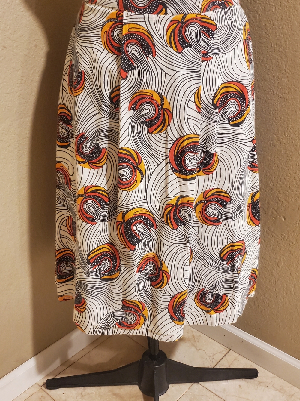 Printed A-Line Skirt in White with Orange and Black Swirl Pattern